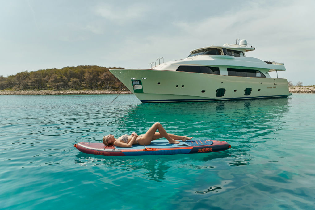 Navetta 26 Friend's Boat at anchor with SUP Dubrovnik Charter